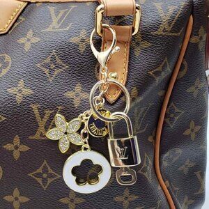 Authentic Louis Vuitton Lock & Key with Unbranded Flower Charm, Keychain